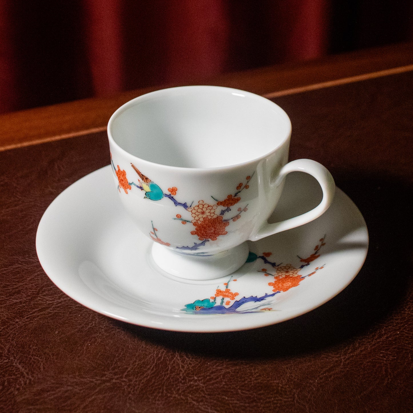 Kakiemon-style plum blossoms and birds tea cup and saucer set (Arita-ware)