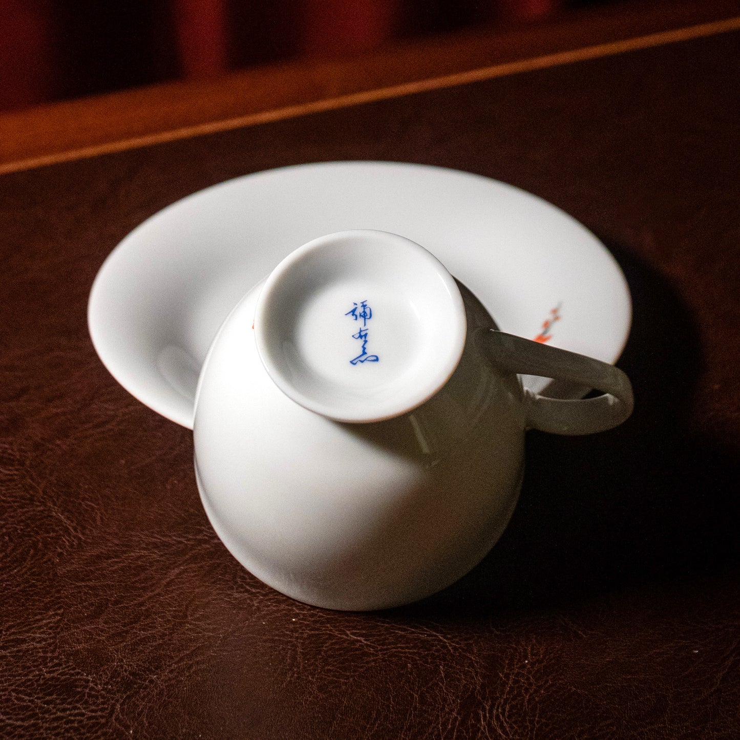 Kakiemon-style plum blossoms and birds tea cup and saucer set (Arita-ware)