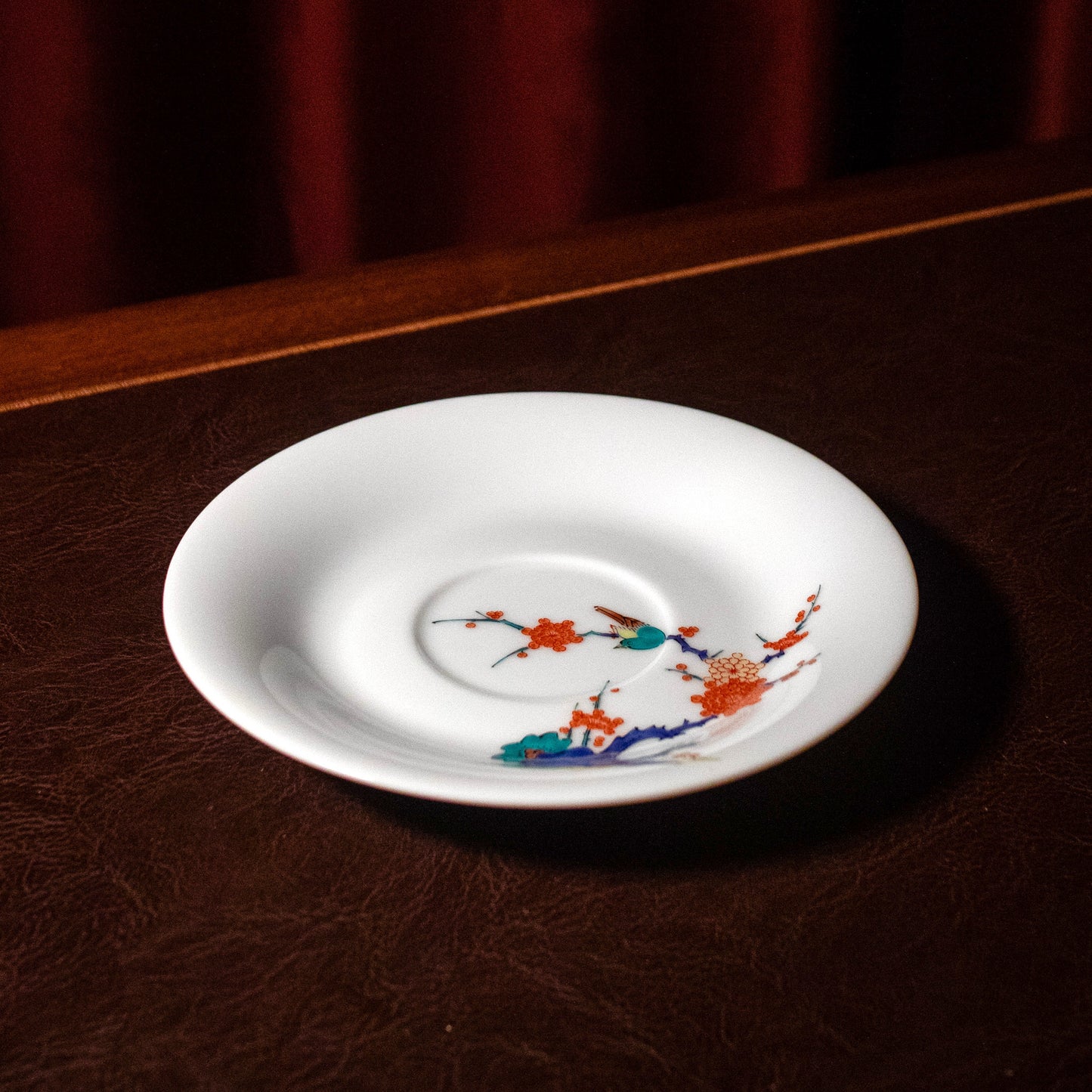 Kakiemon-style plum blossoms and birds tea cup and saucer set (Arita-ware)