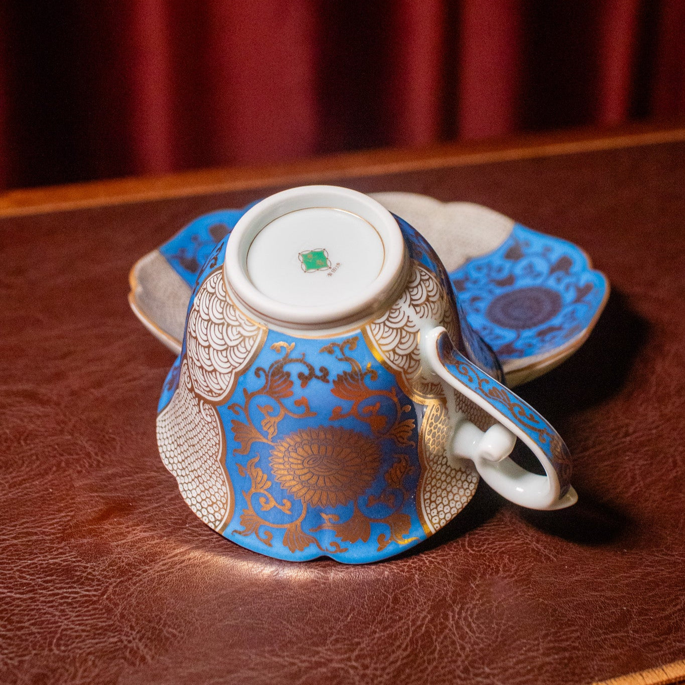 Blue and gold chrysanthemum flower tea cup and saucer set (Arita-ware)