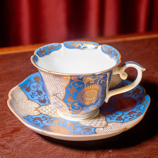 Blue and gold chrysanthemum flower tea cup and saucer set (Arita-ware)