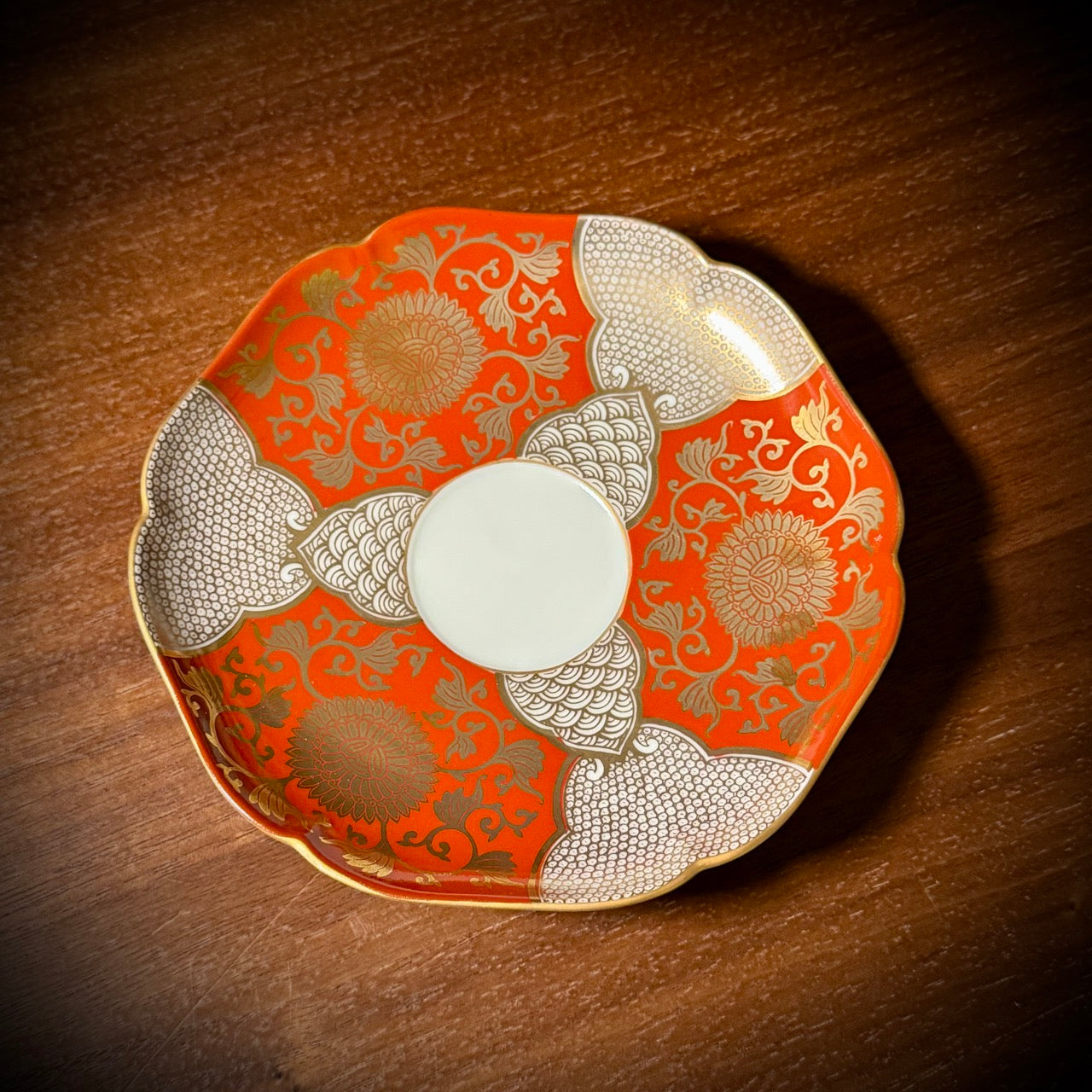 Red and gold chrysanthemum flower tea cup and saucer set (Arita-ware)