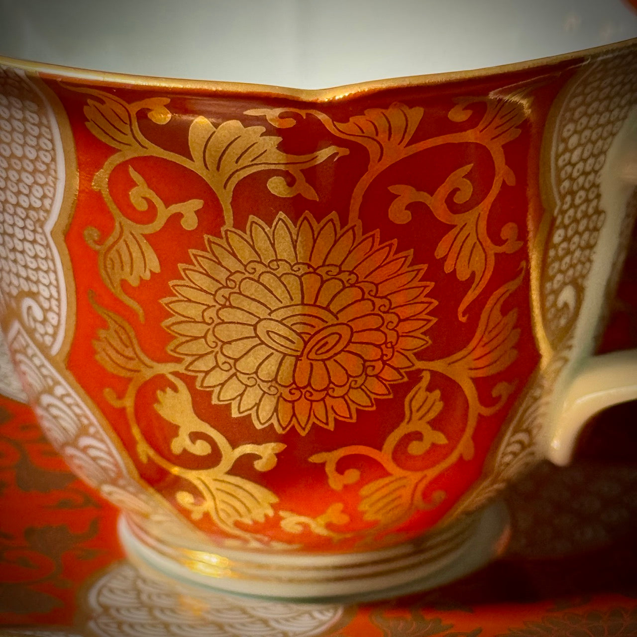 Red and gold chrysanthemum flower tea cup and saucer set (Arita-ware)